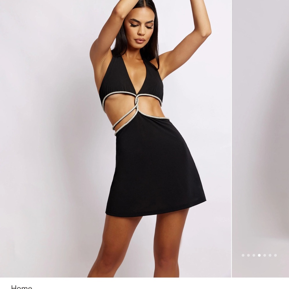 Meshki black sparkly mini dress with cutout.